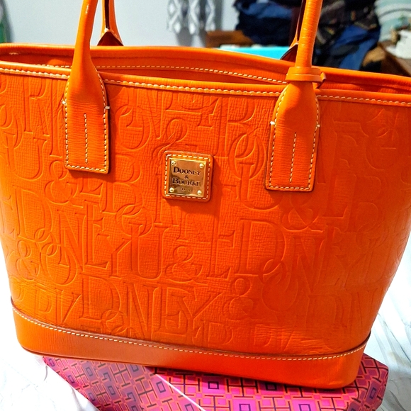 Dooney & Bourke Handbags - Dooney & Bourke Pattern stamped grain leather satchel